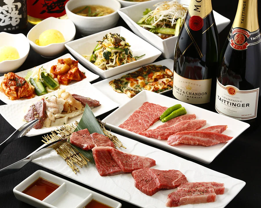 A course meal featuring Wagyu beef, appetizers, and champagne
