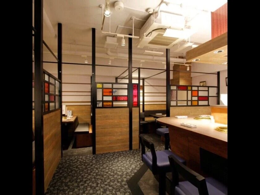 Semi-private table seating and counter seating inside the restaurant