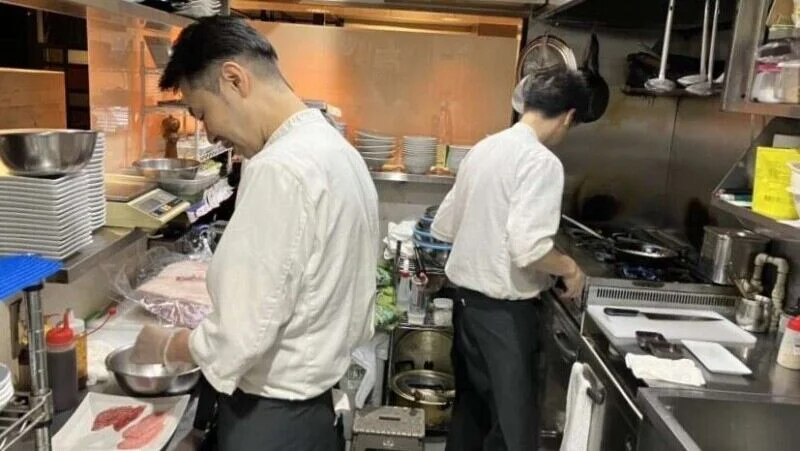 Kitchen staff preparing ingredients